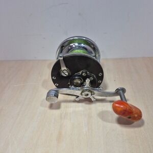 Penn 60 Long Beach Conventional Saltwater Fishing Reel Star Drag Marbled Handle